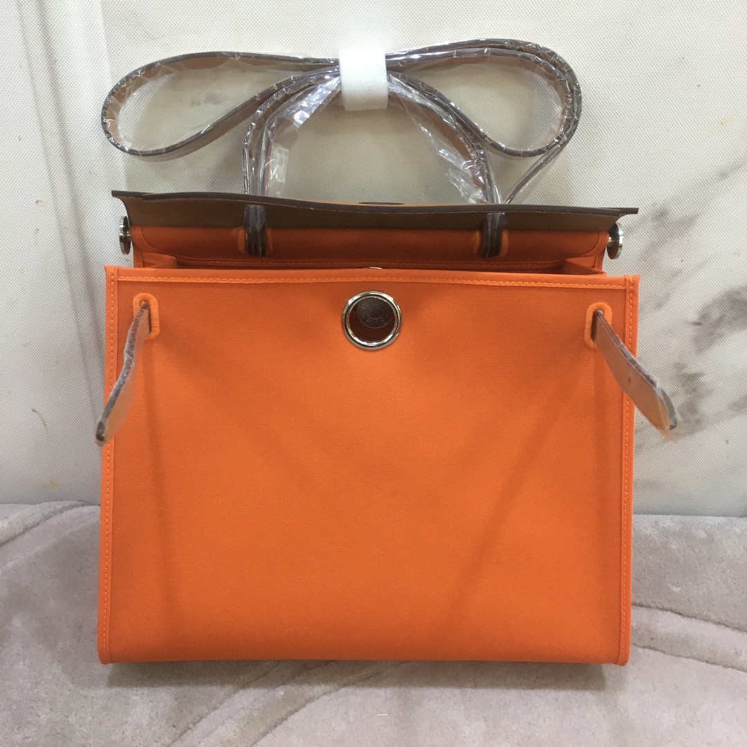 Hermès（爱马仕）Herbag 金棕色拼橙色 Box帆布 银扣 31cm