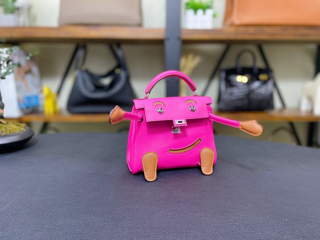 Hermès（爱马仕）Kelly doll 娃娃包 swift 玉兰粉 拼 金色 银扣 16cm