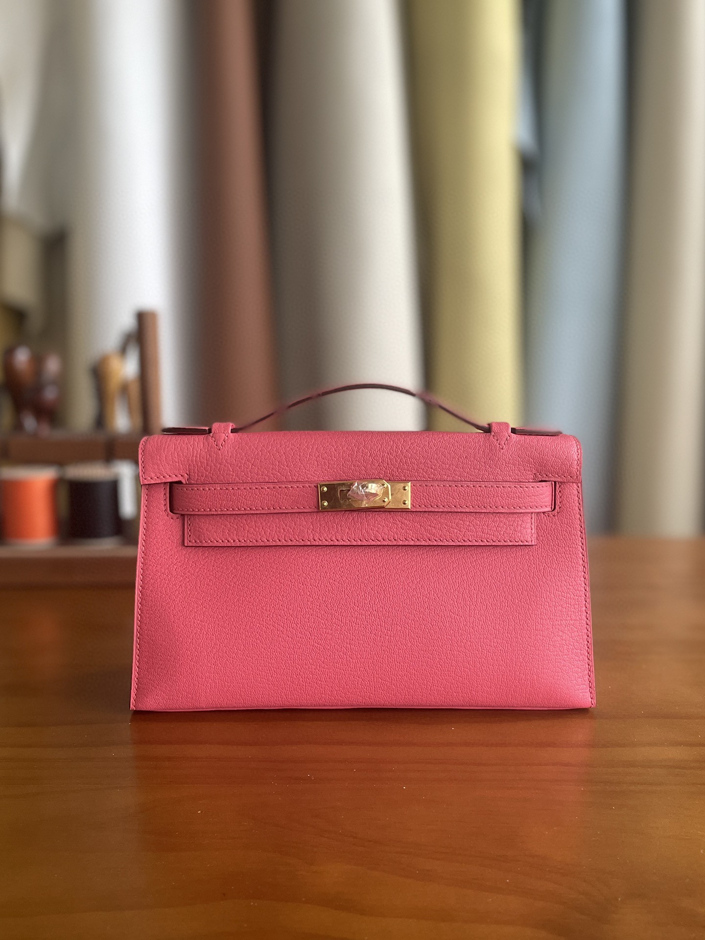 Hermès（爱马仕）mini kelly pochette 山羊皮 8w 新唇膏粉 金扣 22cm