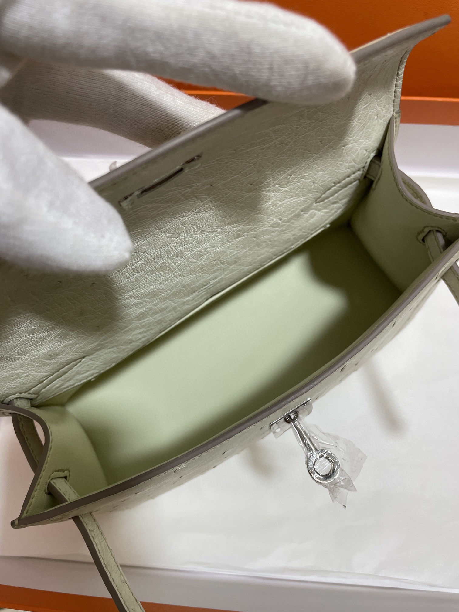 Hermès（爱马仕）mini Kelly 迷你凯莉 南非kk鸵鸟 8L 冰川白 银扣 22cm