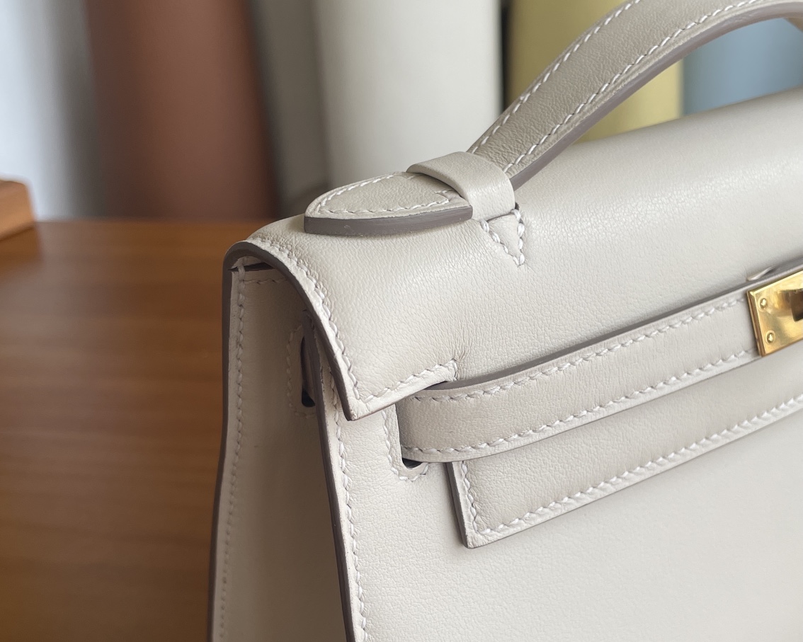 Hermès（爱马仕）mini kelly Pochette Swift皮 奶昔白 金扣 22cm