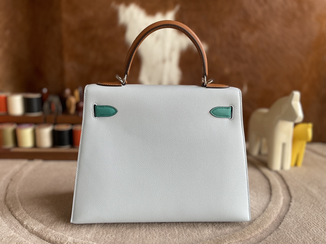 Hermès（爱马仕）Kelly 凯莉包 epsom w0 雾蓝 拼 o6 帝王绿 拼 金棕色 银扣 28cm