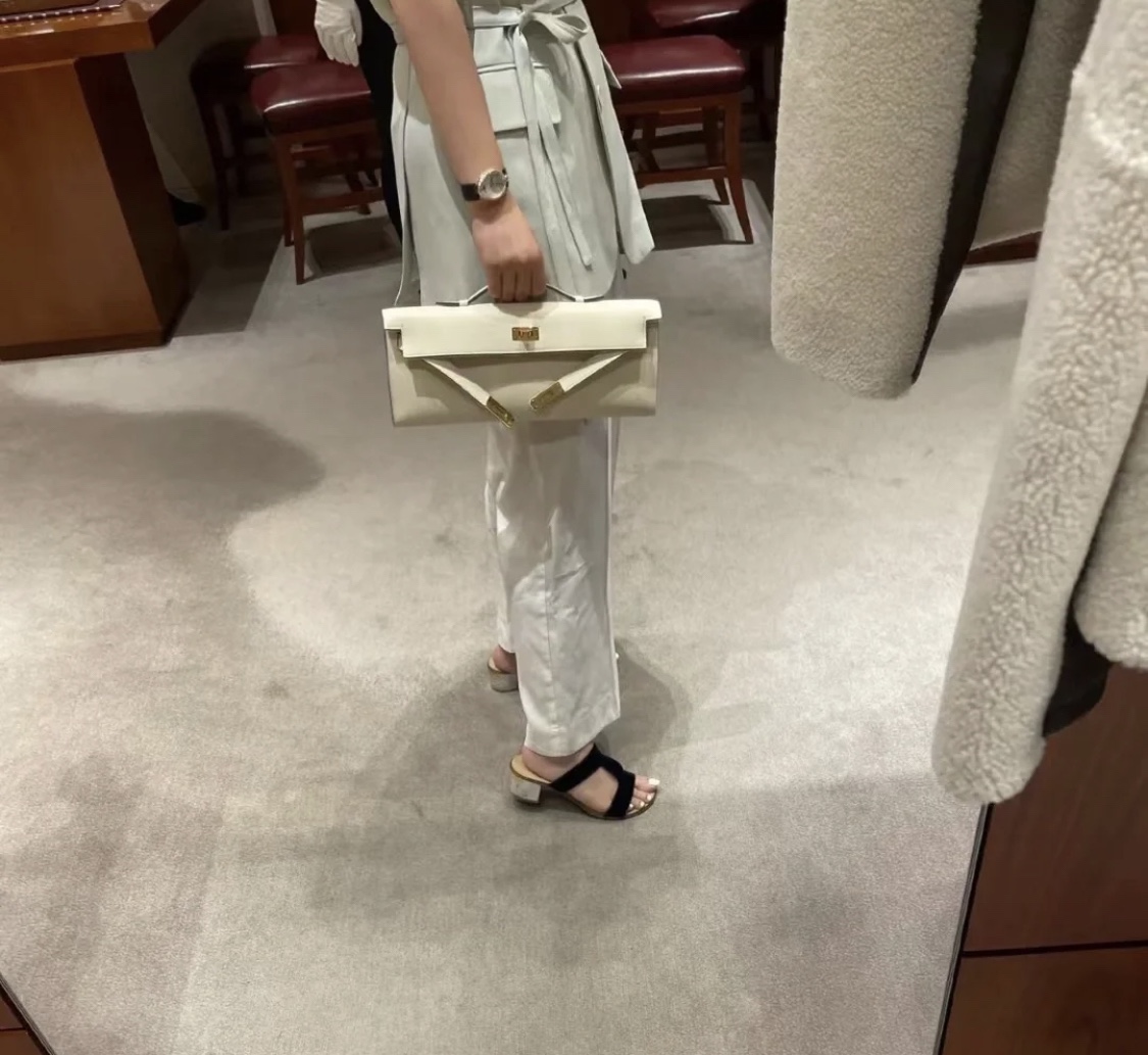 Hermès（爱马仕）Mini Kelly cut Swift 奶油白 金扣 31cm