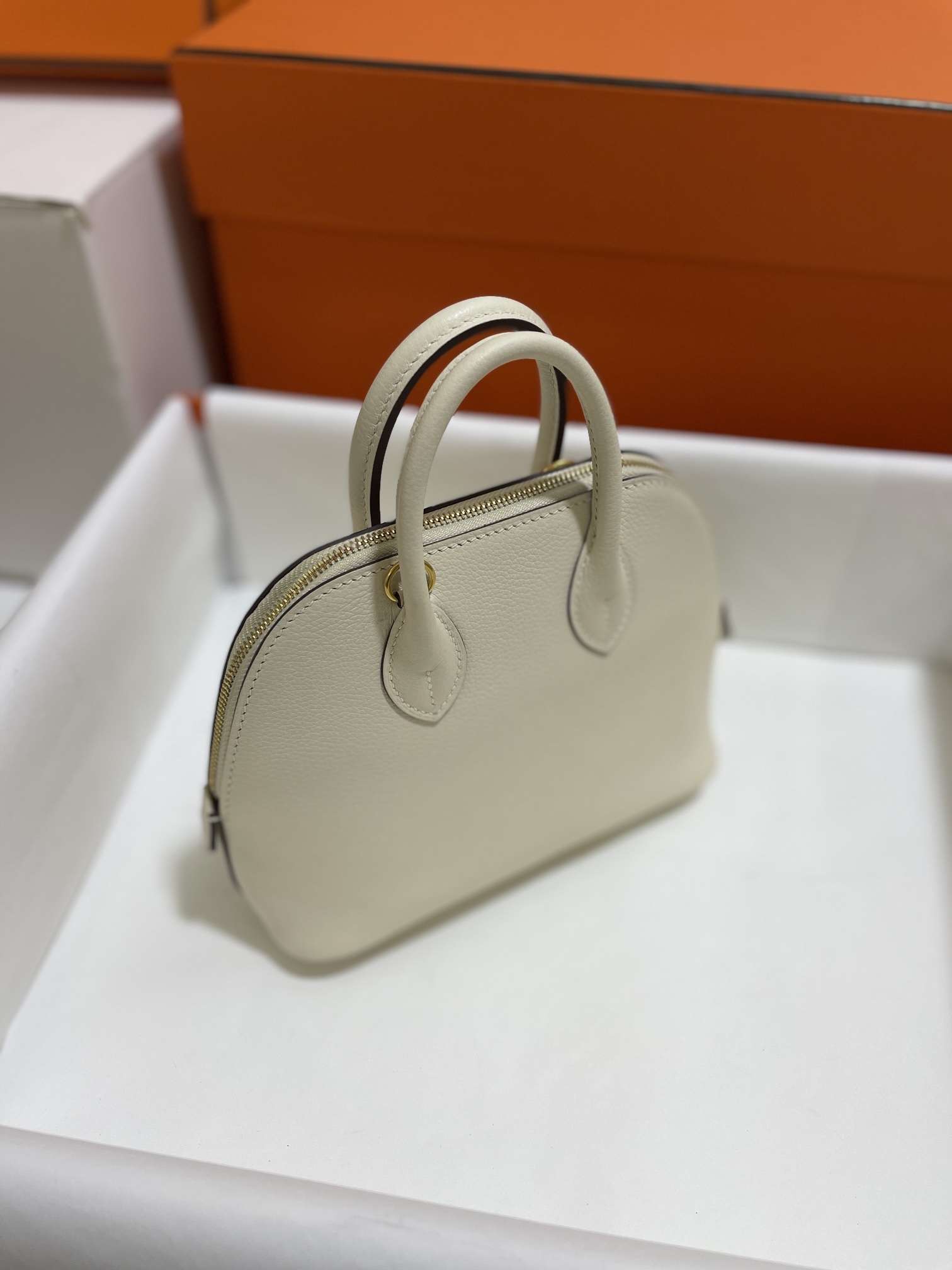 Hermès（爱马仕）Mini Bolide 迷你保龄球包 Evercolor 奶油白 金扣