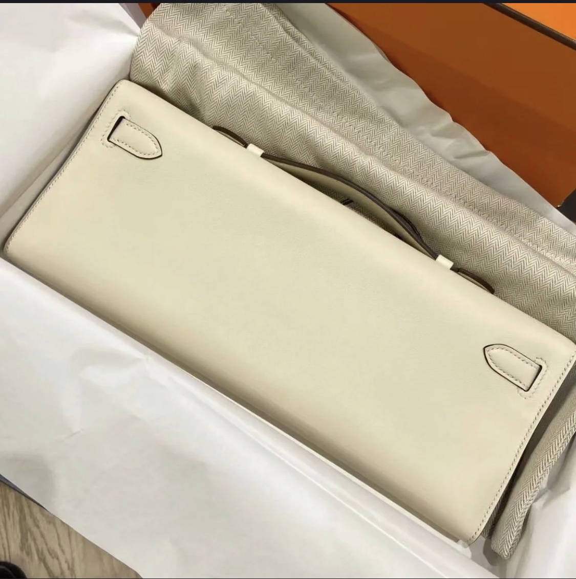 Hermès（爱马仕）Mini Kelly cut Swift 奶油白 金扣 31cm