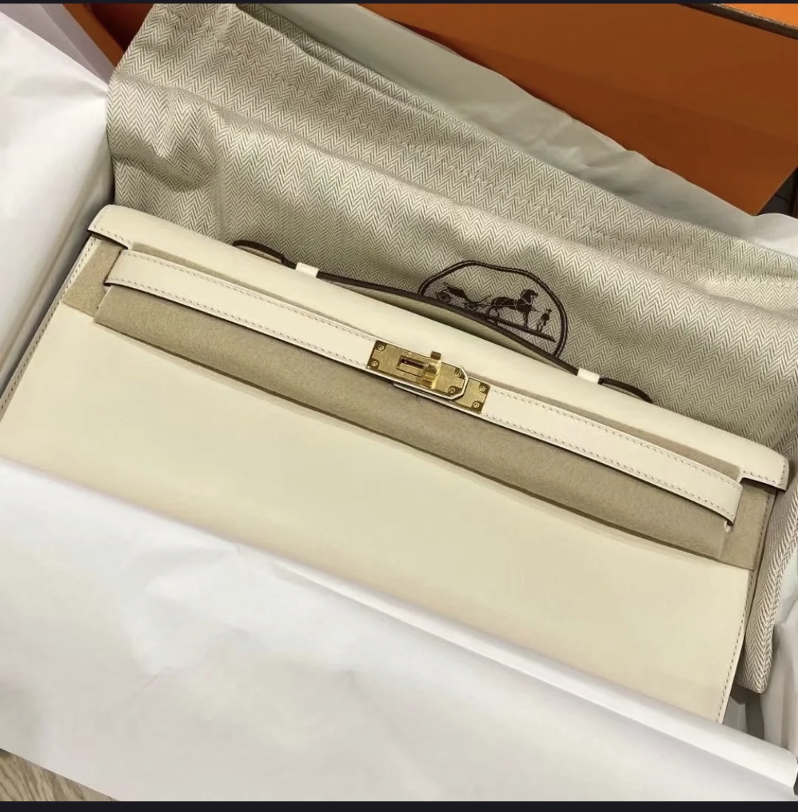 Hermès（爱马仕）Mini Kelly cut Swift 奶油白 金扣 31cm